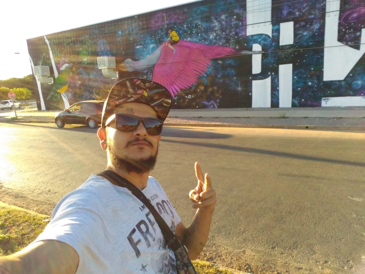 Artista colorindo Sinop