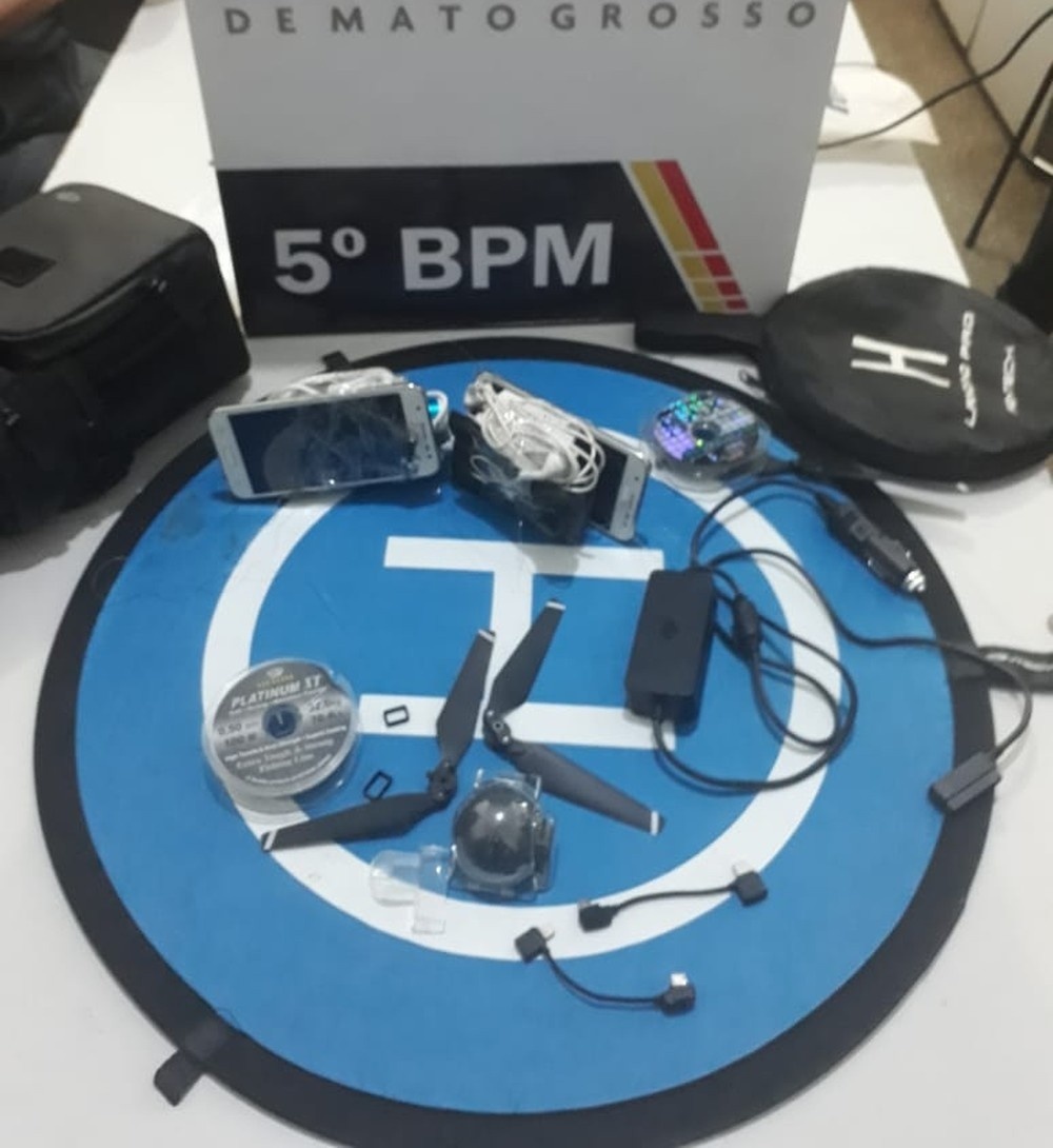 Suspeitos de tentar jogar celulares dentro de presídio em MT com uso de drone são procurados em aterro sanitário