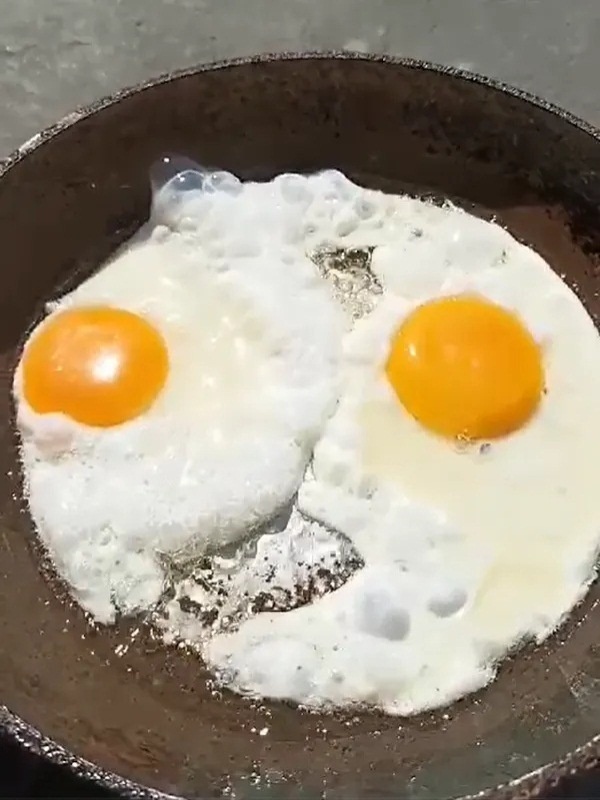 Moradora frita ovo na calçada de casa após Cuiabá bater recorde de calor com mais de 41°C