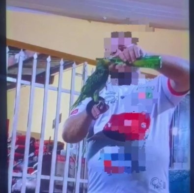 Dono de mercado que aparece em vídeo dando cerveja para papagaio é preso em Cuiabá