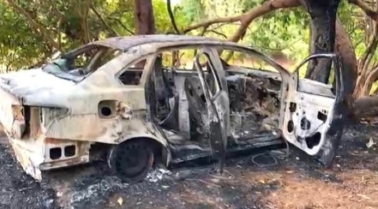 Motorista de aplicativo é encontrado morto próximo a carro incendiado